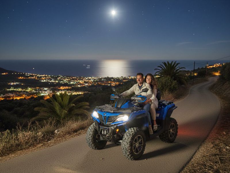 Couple enjoying a night tour with moonlight on a rental ATV in Crete