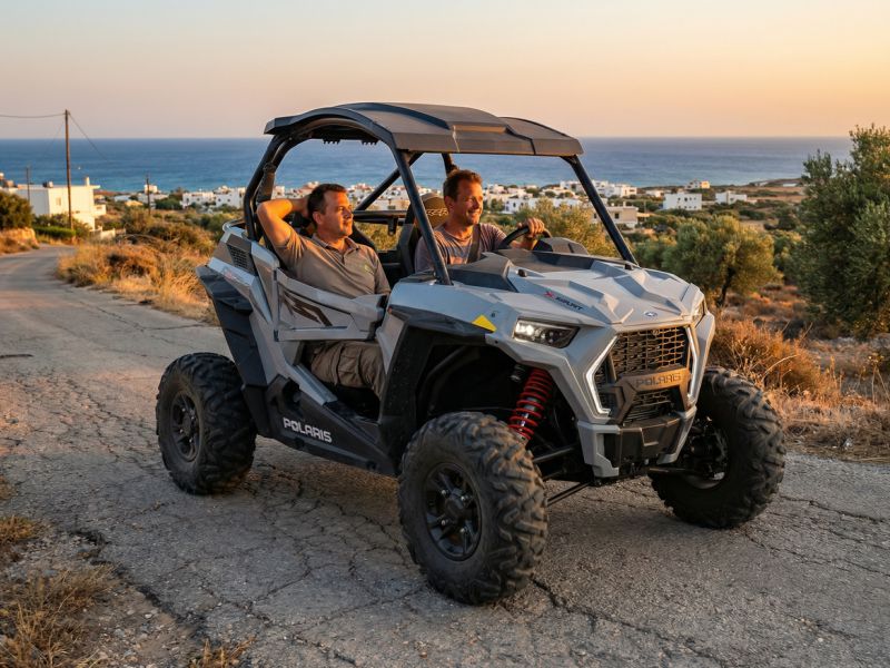Two travelers exploring the Cretan countryside in a powerful Polaris S Trail 1000cc